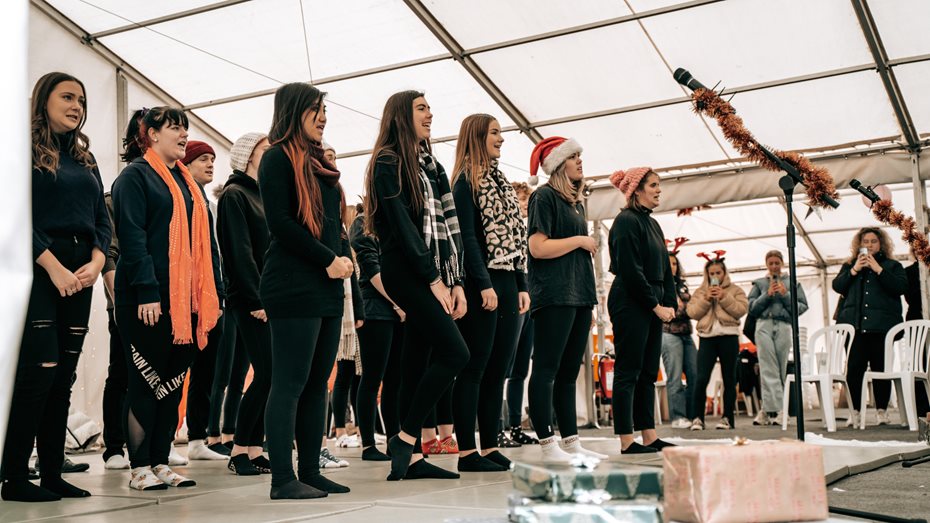 Student choir singing at the Brookes Union Christmas Market
